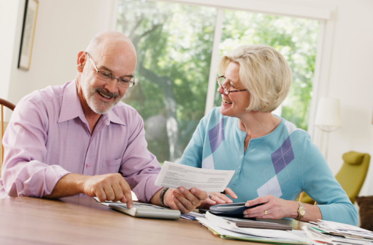 Financial advisor reviewing year-end bonus planning strategies with charts, savings goals, and investment planning visuals